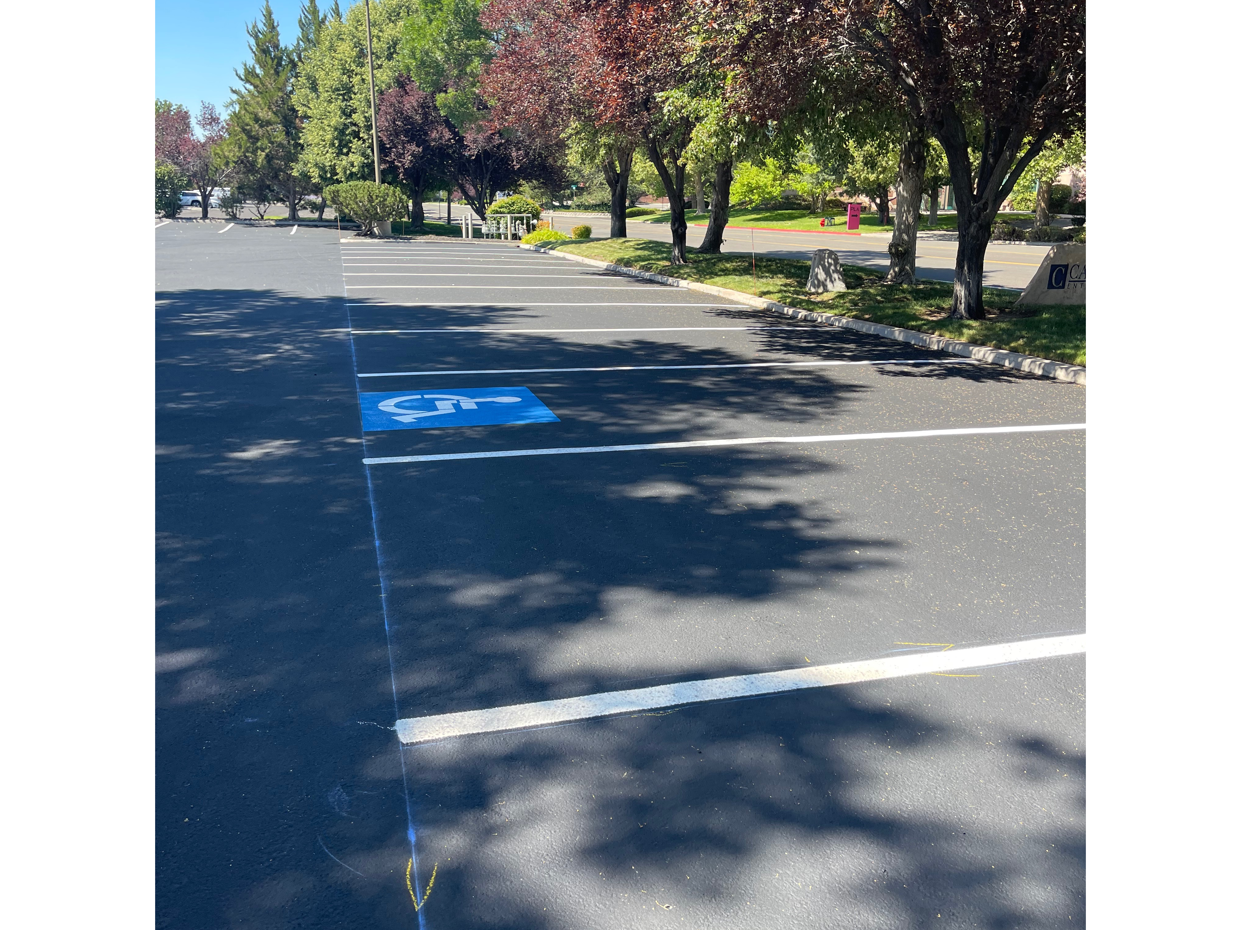 New Parking Lot Striping after Fresh Sealcoat Applied