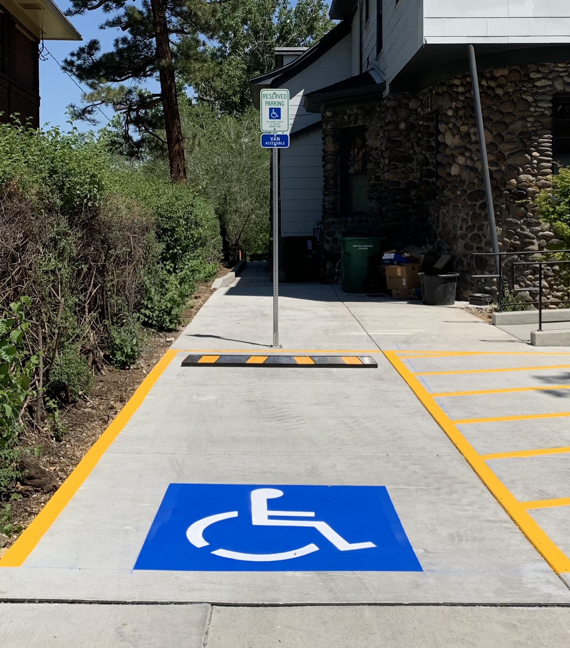 Installed Handicap Sign, Wheel Stop, Cross-hatch Area, and Handicap Stencil Marking